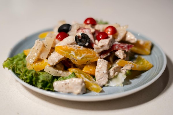 How can an immersion blender simplify the process of making soups and sauces?